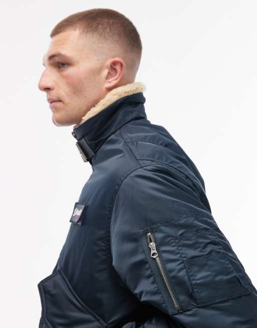 Schott logo patch zip pocket detail cropped padded buckle jacket with faux fur collar in navy, 4 of 5