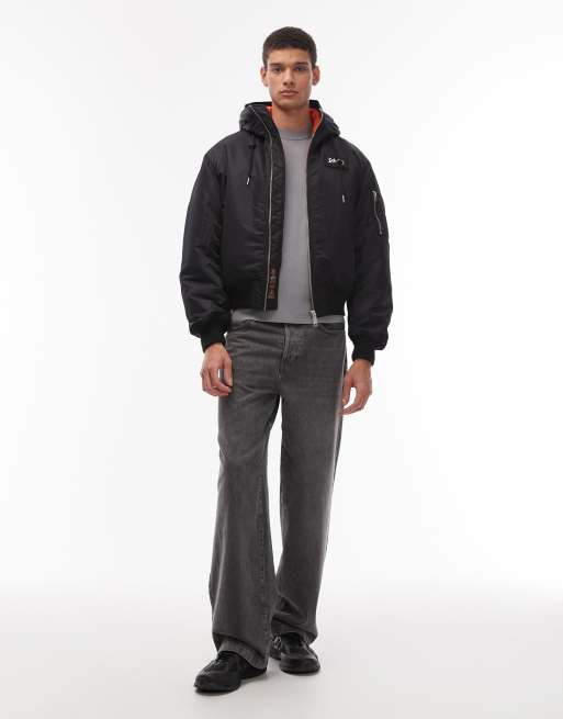 Schott logo patch zip pocket detail cropped padded jacket with