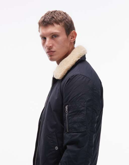 Schott logo patch zip pocket detail cropped padded jacket with faux fur collar in navy