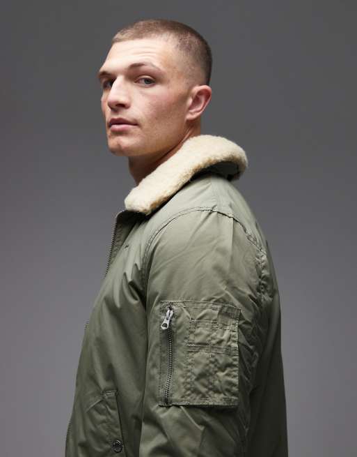 Schott logo patch zip pocket detail cropped padded jacket with faux fur collar in sage/beige, 4 of 5