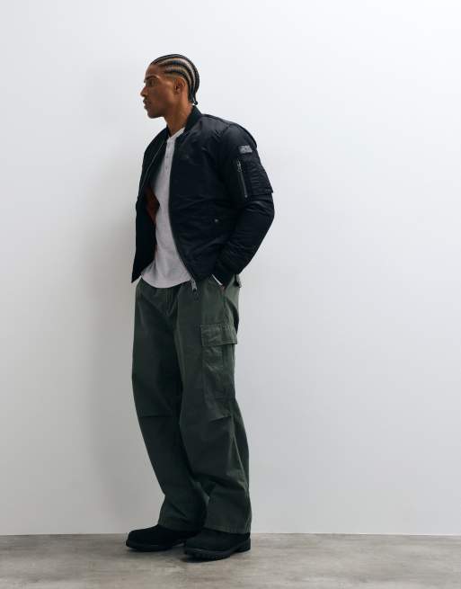 Schott padded nylon bomber jacket in black, 2 of 5