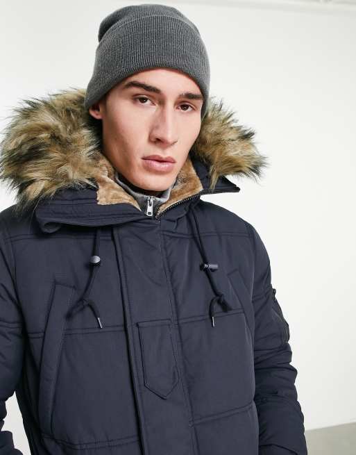 Schott – Snorker – Marinblå quiltad parkas med fuskpälshuva, 3 av 4
