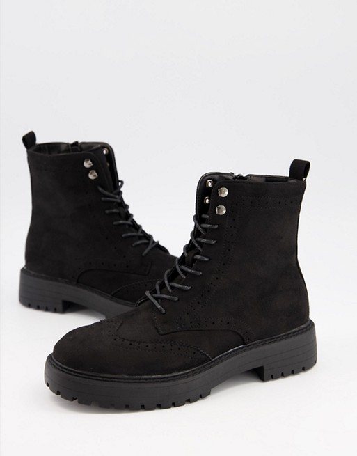 schuh Anabelle lace up flat boots with brogue detail in black suedette