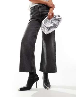 Babette sock heeled ankle boots with toe cap in black