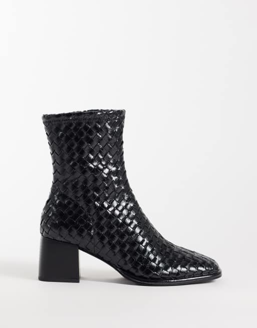 Schuh Botines tipo calcetín tejidos negros, 1 de 4