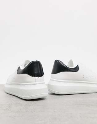 white sneakers with black back