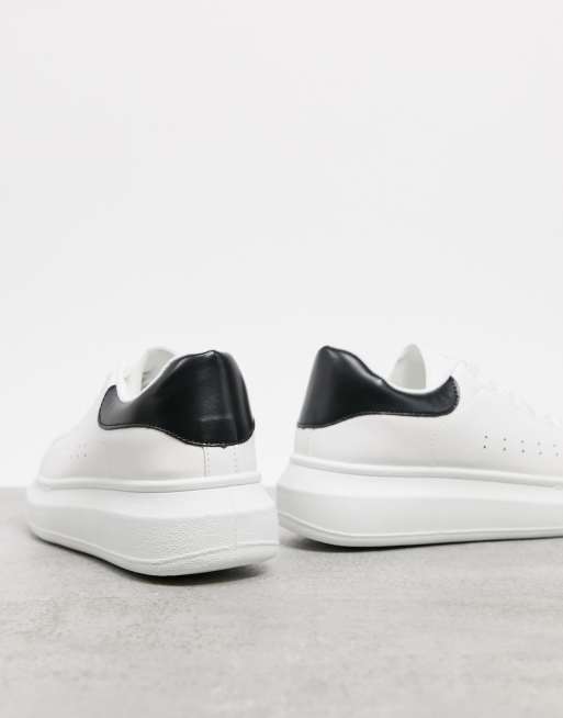 schuh Breezy flatform lace up trainer with black back tab in white