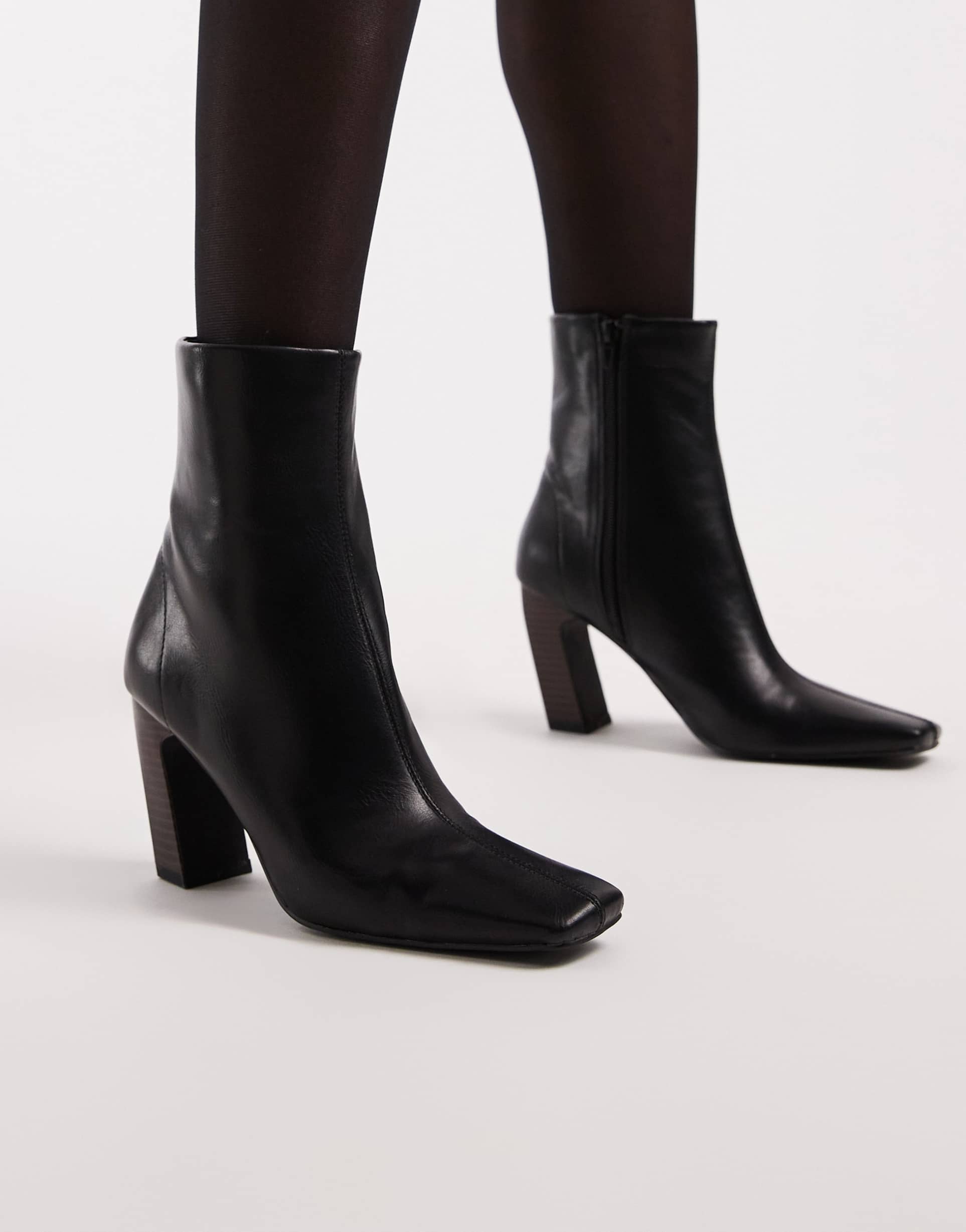 schuh bryson curved heel mid ankle boots in black