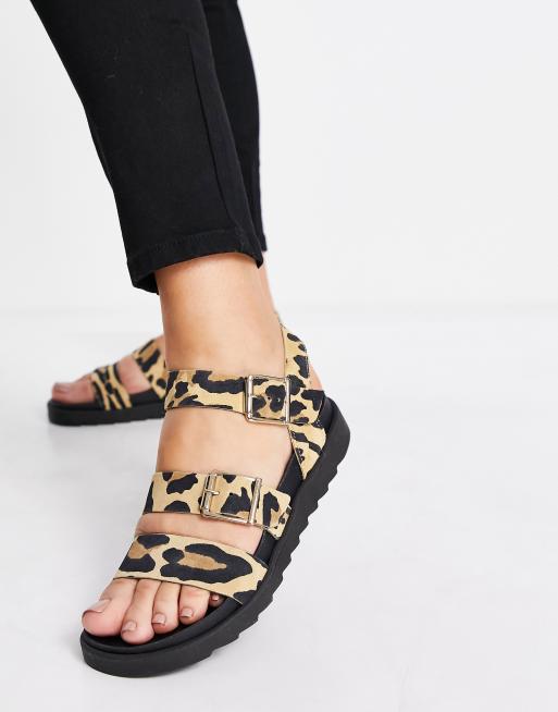 schuh Chaser leather buckle strappy sandals in animal | ASOS