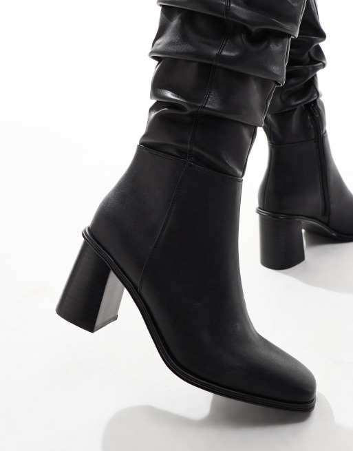 schuh - Daria - Gerimpelde kniehoge laarzen met blokhak in zwart, 2 van 4