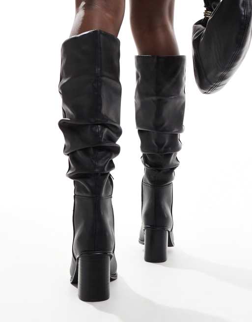 schuh - Daria - Gerimpelde kniehoge laarzen met blokhak in zwart, 3 van 4