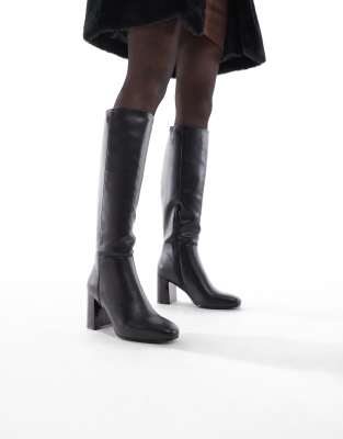 schuh - Devlin - Kniehohe Stiefel in Schwarz mit Absatz