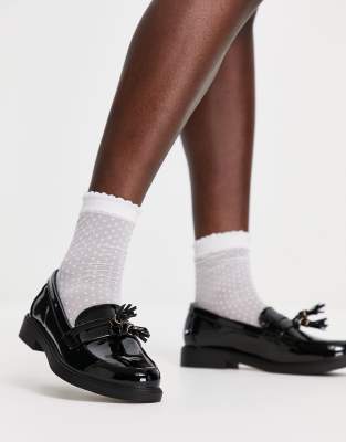 schuh Lane tassel loafers in black patent