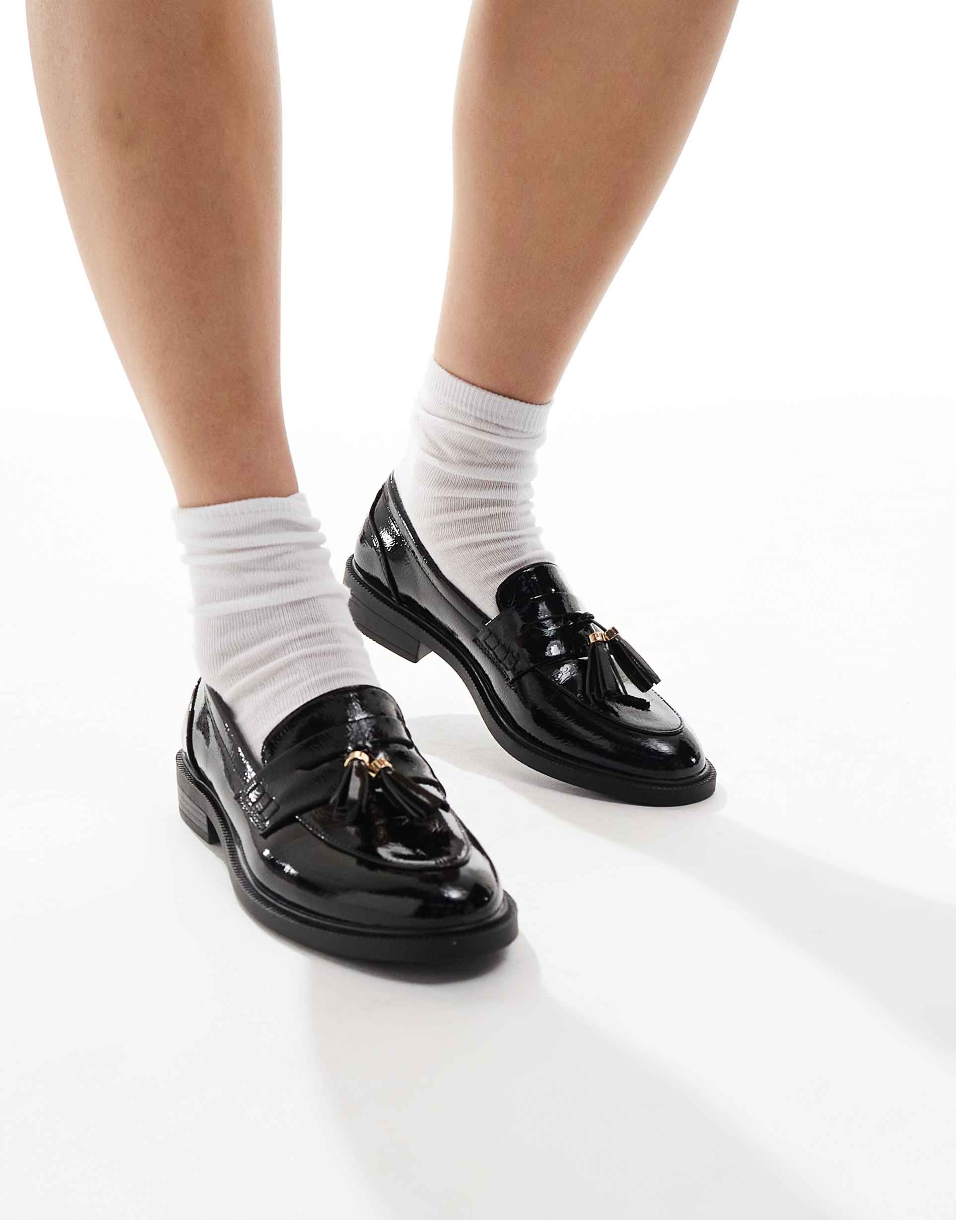 schuh lane tassel loafers in black patent