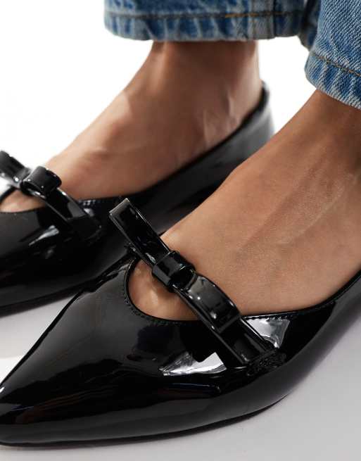 schuh Larisa bow pointed toe ballet flats in black patent, 2 of 4