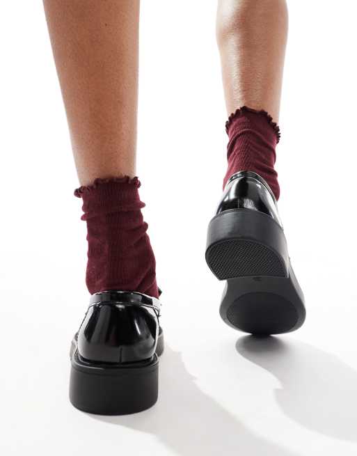 schuh Lawton tassel loafers in black, 3 of 4