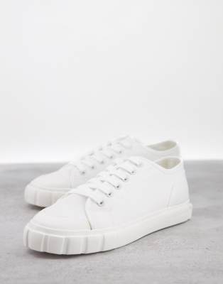 white trainers with black back