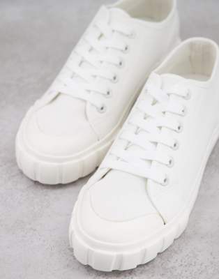 white trainers with black back