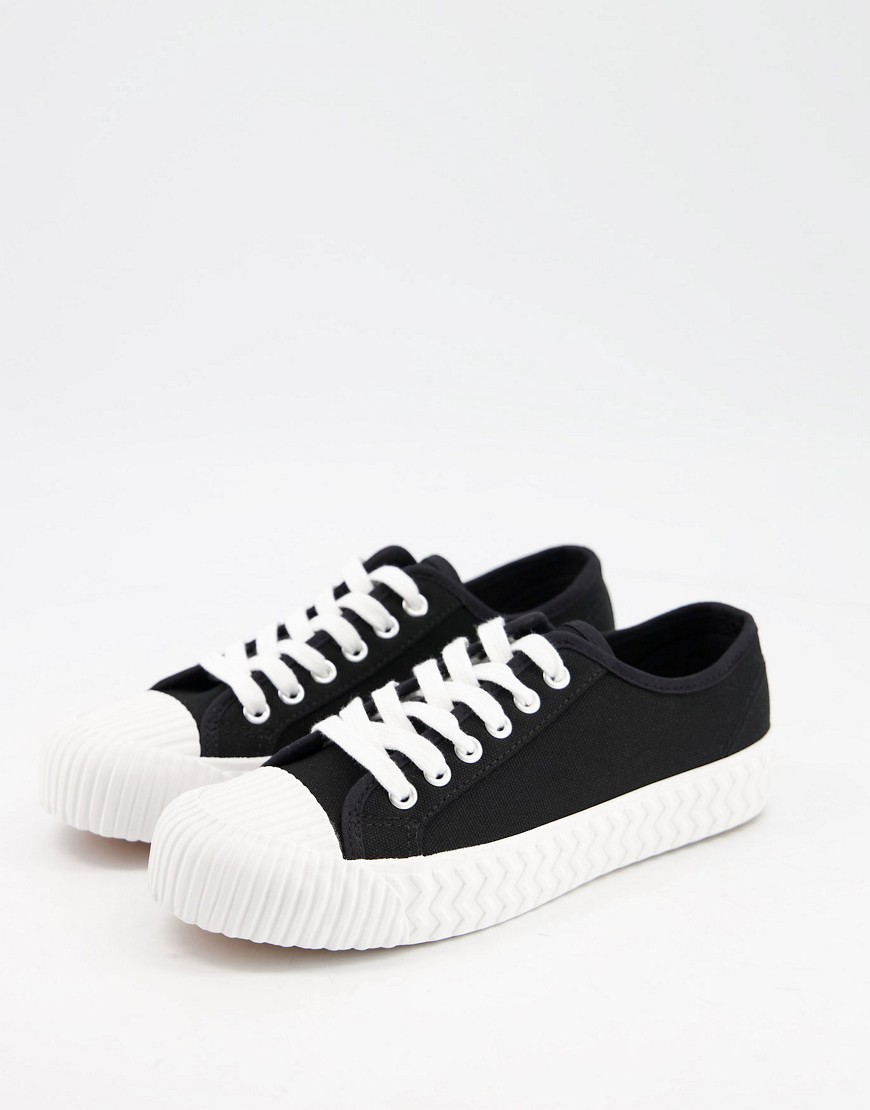 schuh Mia lace up flatform canvas trainers in black