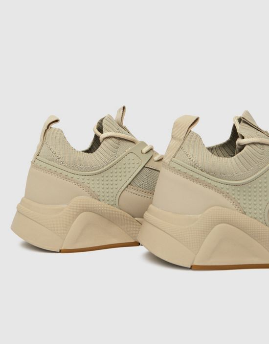 https://images.asos-media.com/products/schuh-nava-sneakers-with-sock-detail-in-natural/202355787-4?$n_550w$&wid=550&fit=constrain