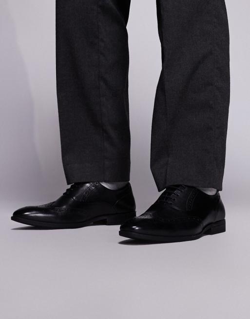 schuh - Row - Scarpe Derby in pelle nere con lacci e dettagli brogue