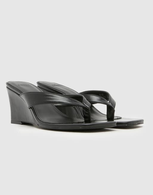 Schuh Soloman thong wedge in black, 2 of 4