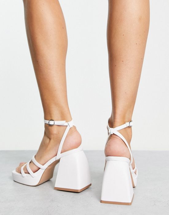https://images.asos-media.com/products/schuh-swae-platform-heeled-sandals-in-white/201909274-3?$n_550w$&wid=550&fit=constrain