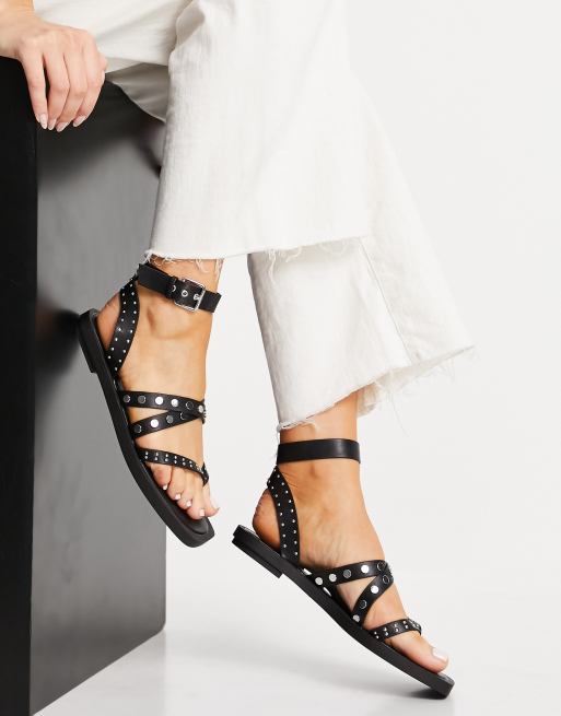 schuh Tale Sandales plates clout es entredoigt et lani res Noir