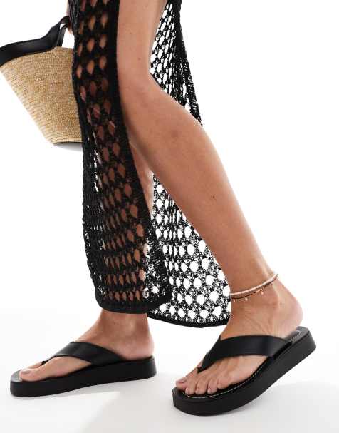 schuh – Tanisha – Svarta flip flops i läder med flatform-sula - view 1