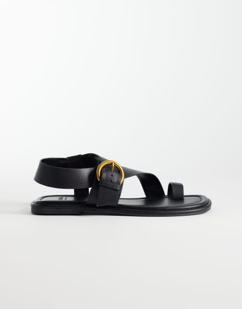 schuh Tanvi toe loop sandals with ankle strap and buckle detail in black leather - view 1
