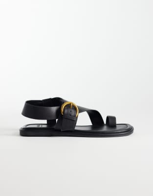 Schuh Tanvi Toe Loop Sandals With Ankle Straps And Buckle Detailing In Black