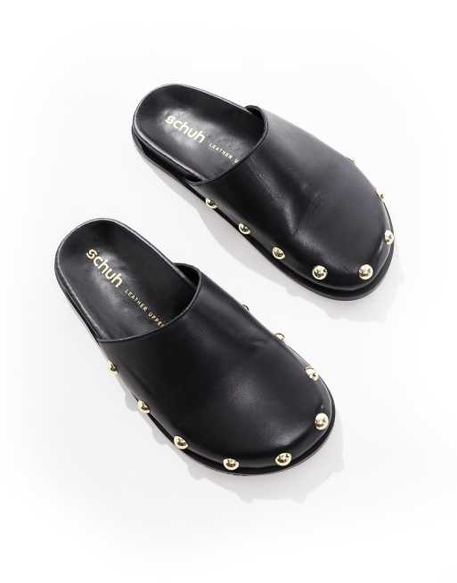 schuh Teale clog mules in black leather 