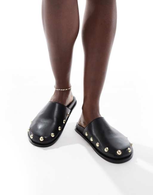 schuh Teale clog mules in black leather 