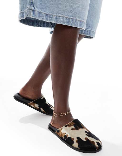 schuh Teale clog mules in cow print pony hair