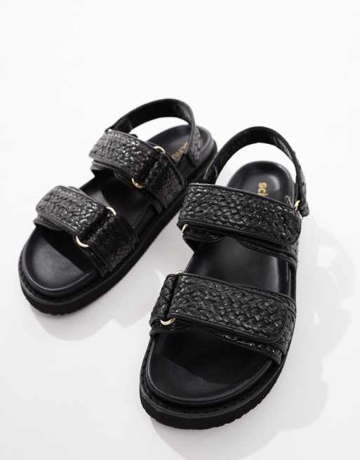schuh Tiesha footbed sandals in black raffia | ASOS