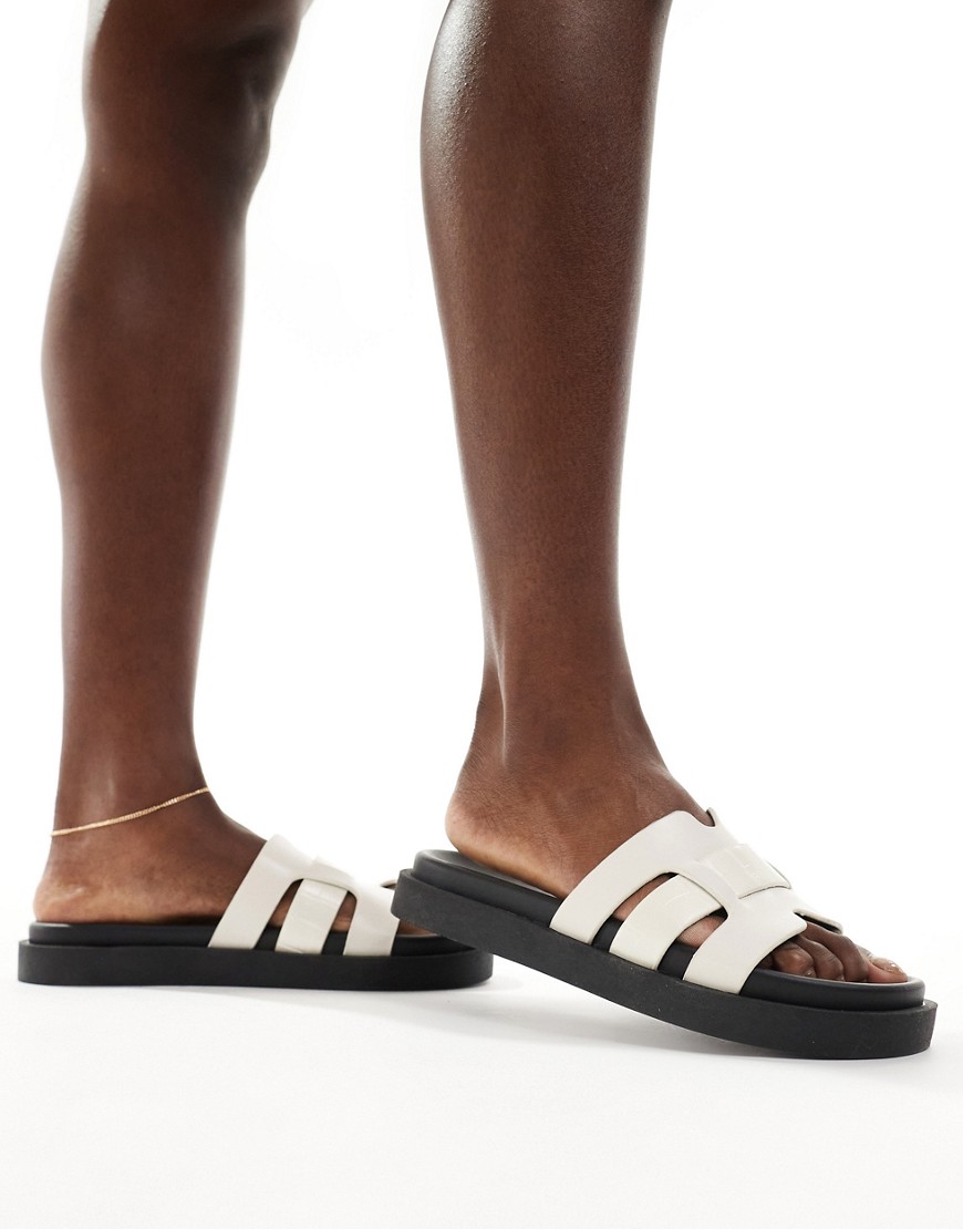 schuh Timmy flat sandals in ecru croc-White
