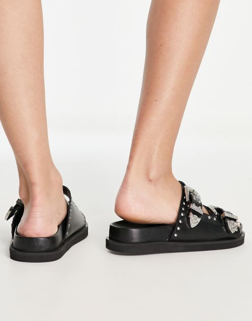 schuh – Treasure – Slider-Sandalen aus Leder in Schwarz mit Nietenbesatz, 2 von 4