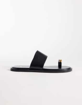 Schuh Tyme Toe Loop Sandals With Gold-tone Embellishment In Black