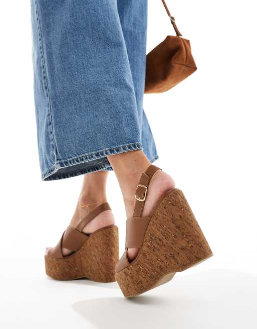 schuh Valentina cross strap cork wedge heeled sandals in tan ASOS