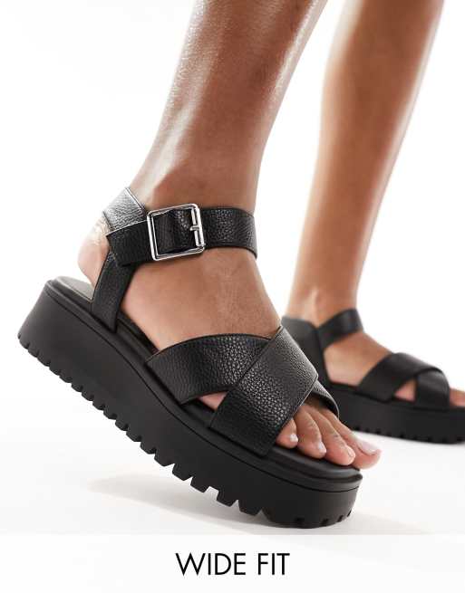 schuh Wide Fit – Tera – Czarne sandały ze skrzyżowanymi paskami