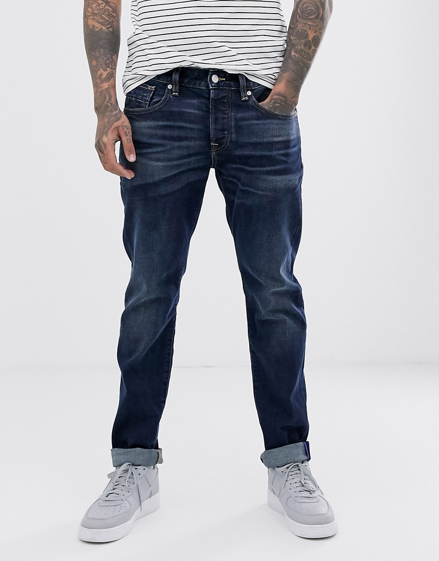 Scotch and Soda - Ralston - Regular slim-fit jeans in marineblauw wassing