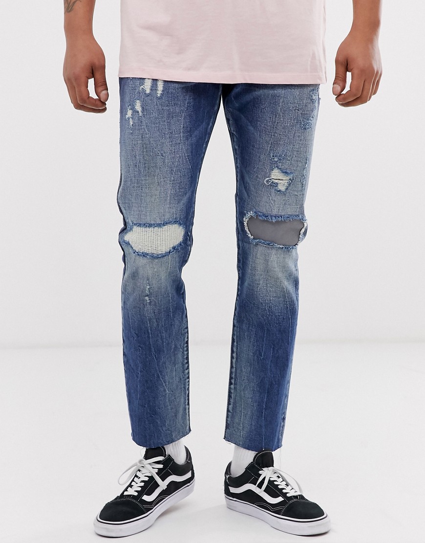 Scotch and Soda - Ralston - Slim-fit jeans met herstelde patches-Blauw