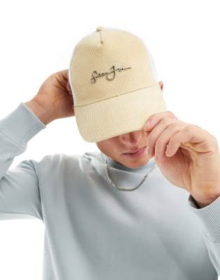 Sean John script logo baseball trucker cap in beige and white