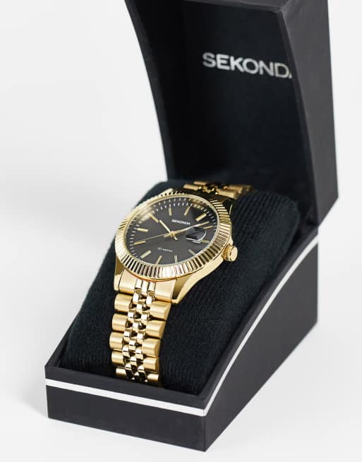 Gold watch black online face