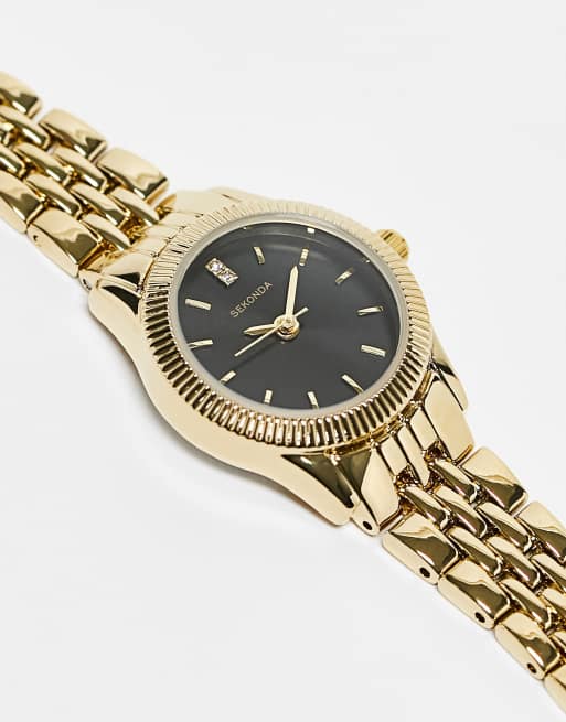 Ladies gold watch with black outlet face