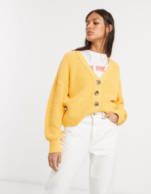 yellow cardigan