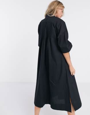 black pleated shirt dress