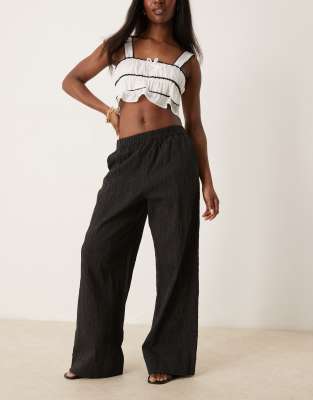 Selected Selected Femme textured pattern loose fit trousers in black