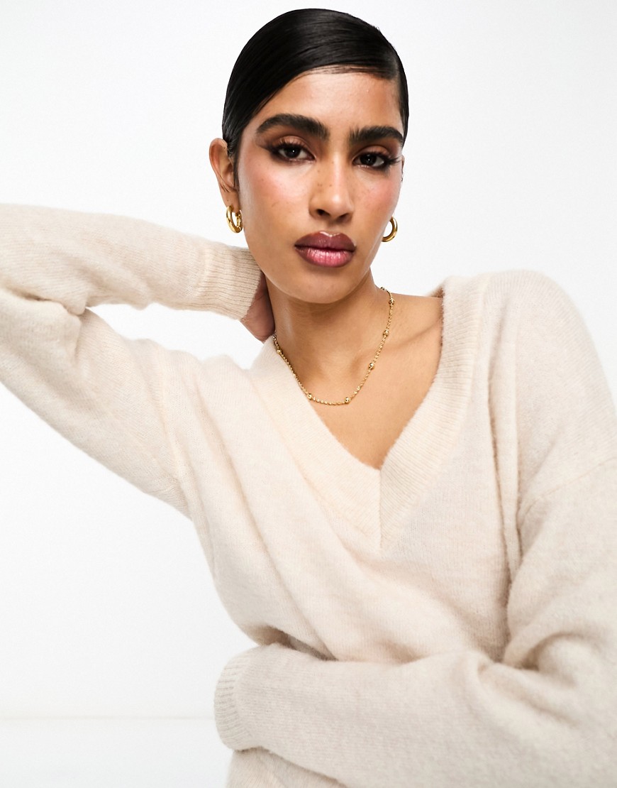 Femme v neck knit sweater in cream-White