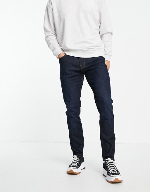 Jean slim bleu foncé homme sale